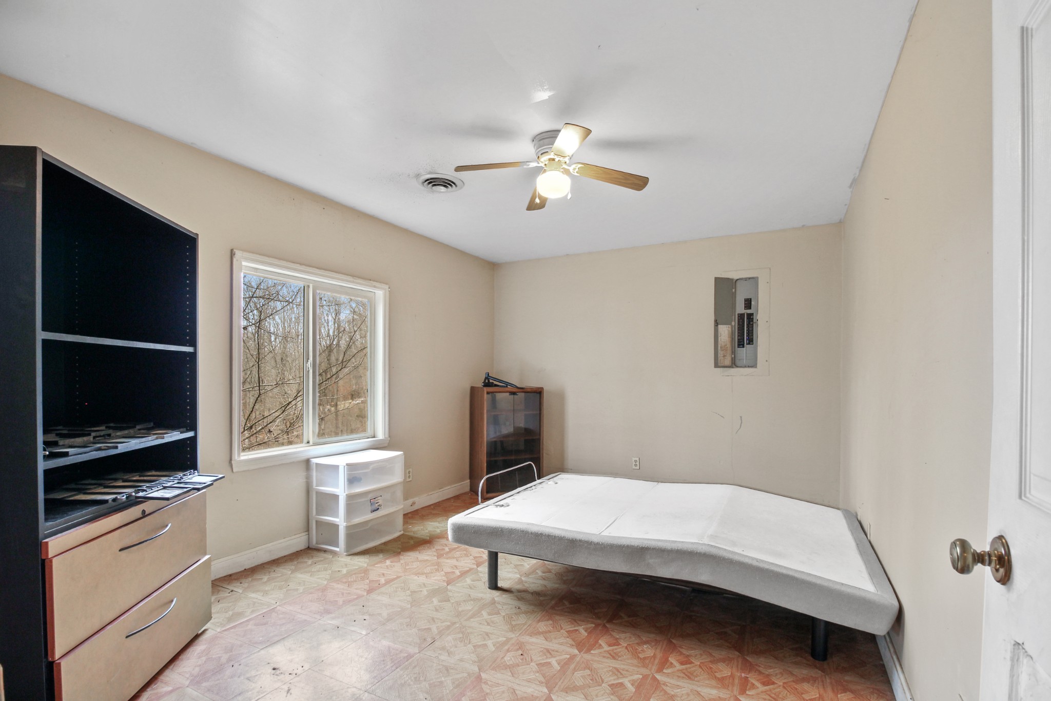 7164 Brush Creek Road South Fairview, TN 37062 - Photo 5 of 11 a bedroom with a bed and a flat screen tv