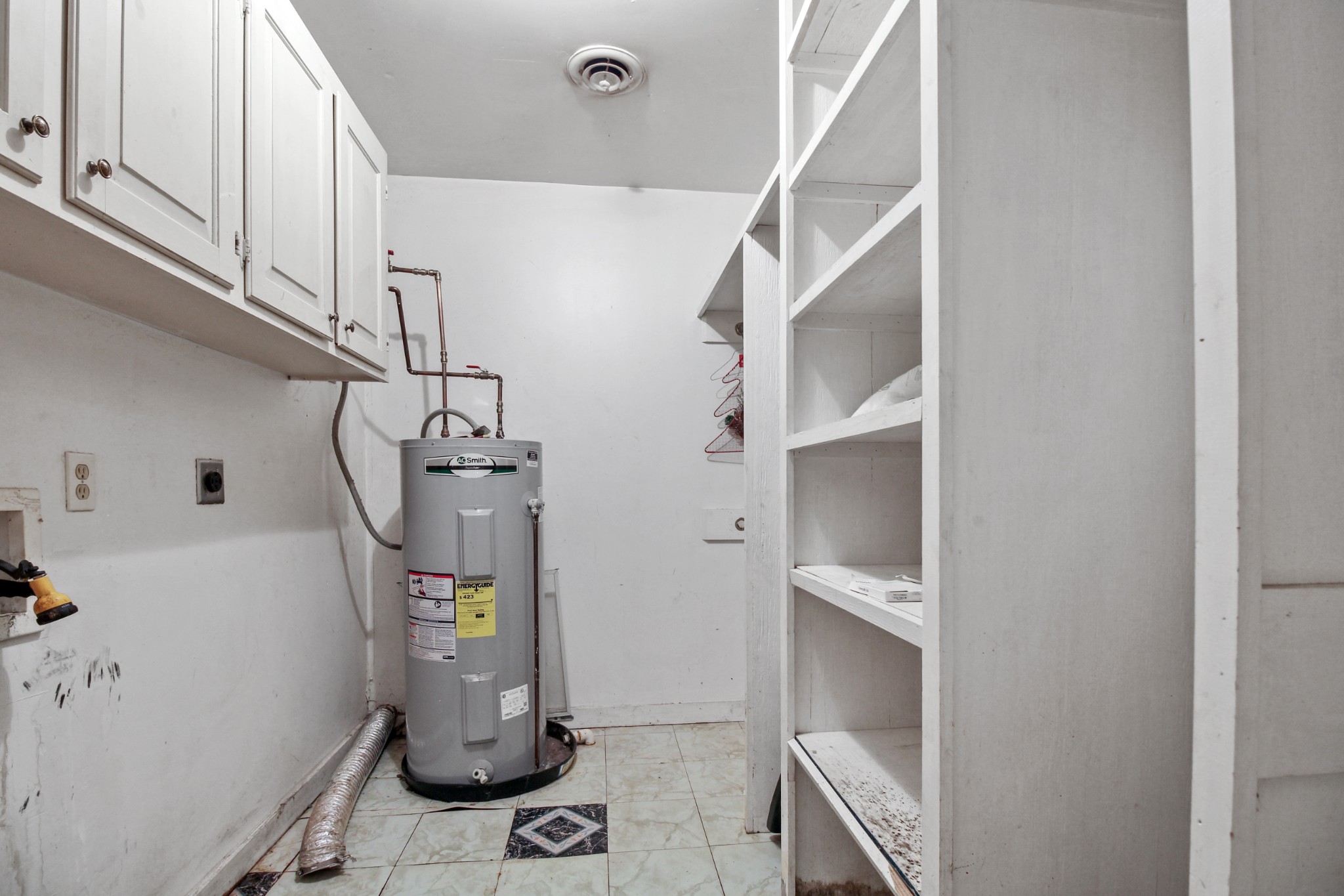 7164 Brush Creek Road South Fairview, TN 37062 - Photo 8 of 11 a view of storage and utility room with empty racks