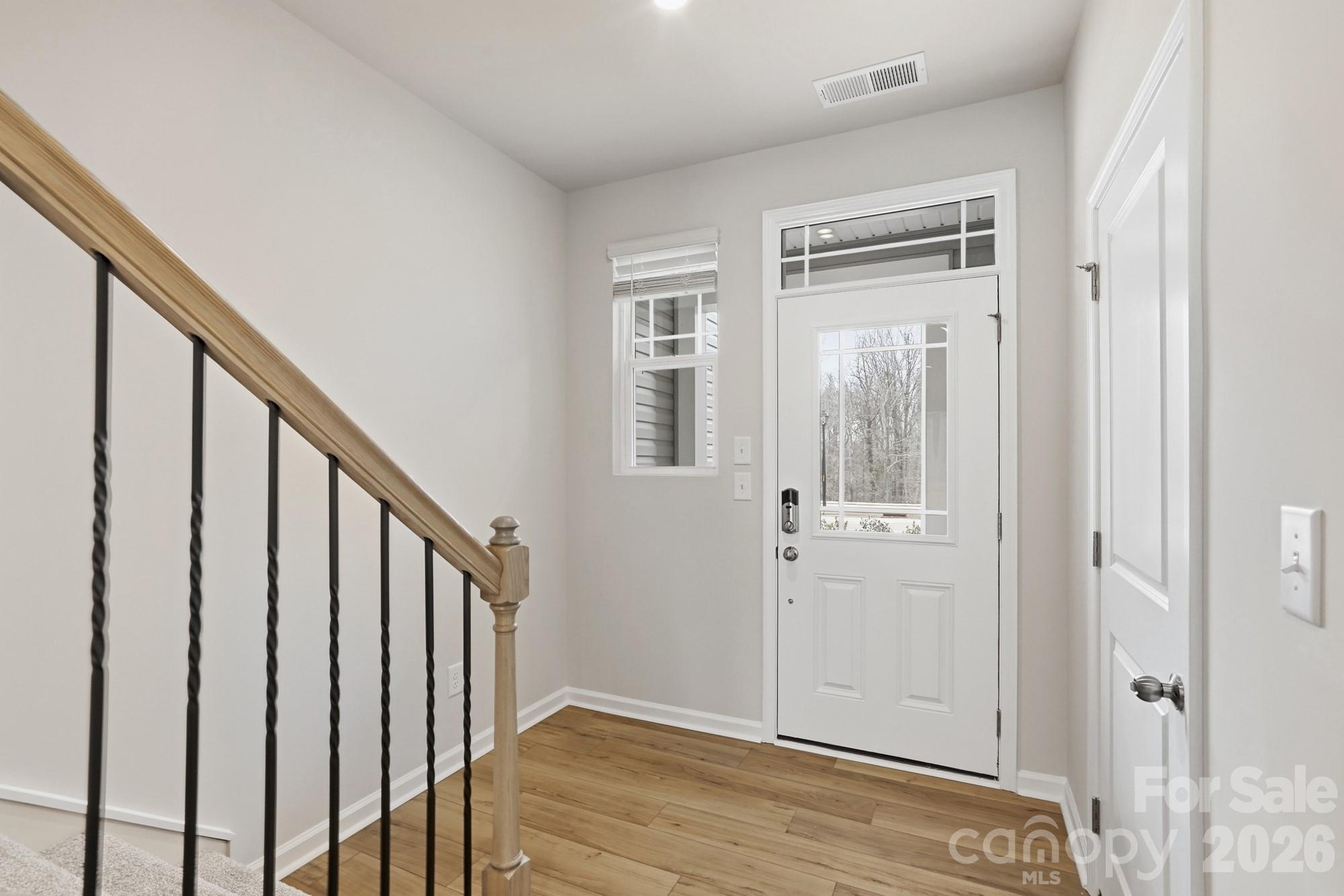 2540 Hedgecliff Road Kannapolis, NC 28083 - Photo 2 of 22 a view of an entryway with wooden floor