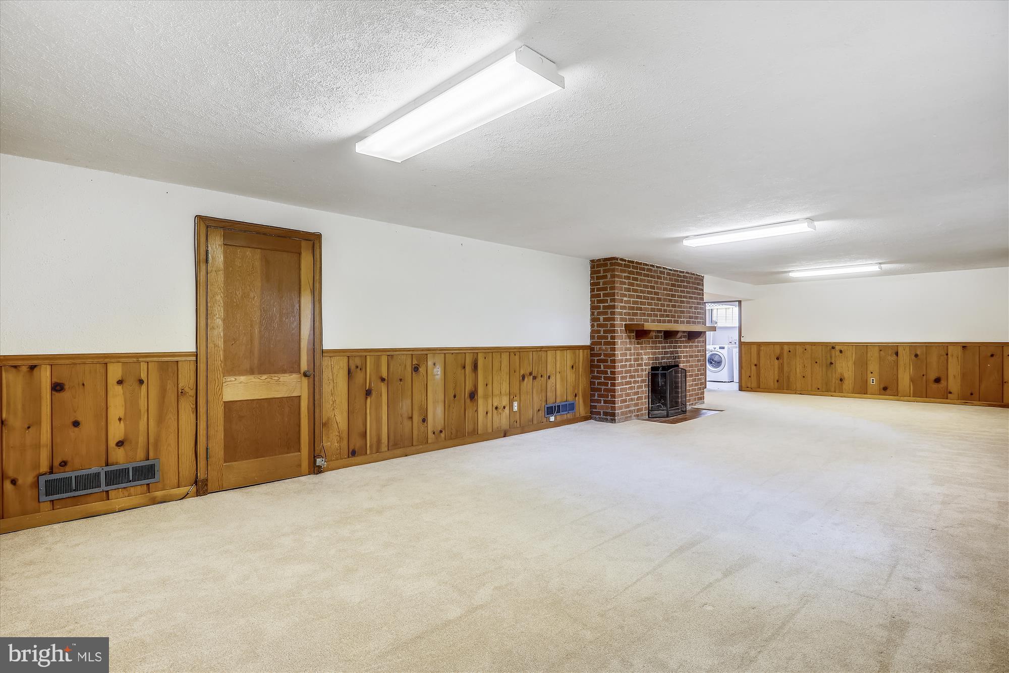 3303 Winnett Road Chevy Chase, MD 20815 - Photo 32 of 54 a view of empty room with a fireplace