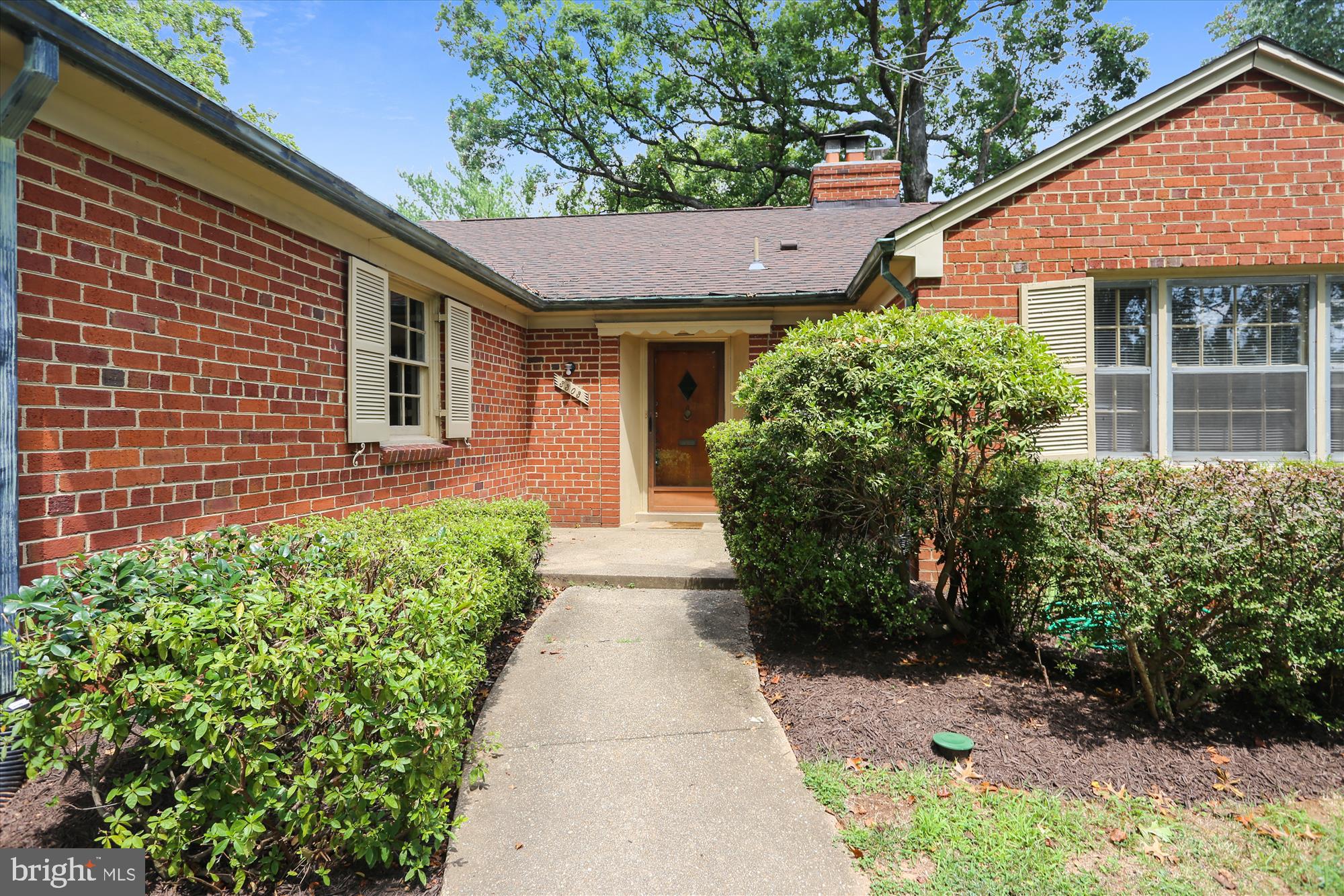 3303 Winnett Road Chevy Chase, MD 20815 - Photo 52 of 54 a view of a house with a garden