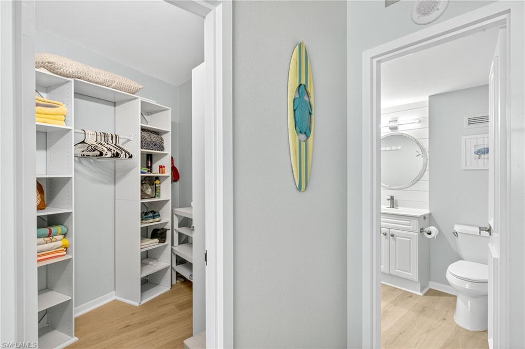 58 North Collier Boulevard, Unit 1606 Marco Island, FL 34145 - Photo 15 of 37 a bathroom with a toilet and a shower