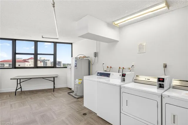 a view of workspace with furniture and window