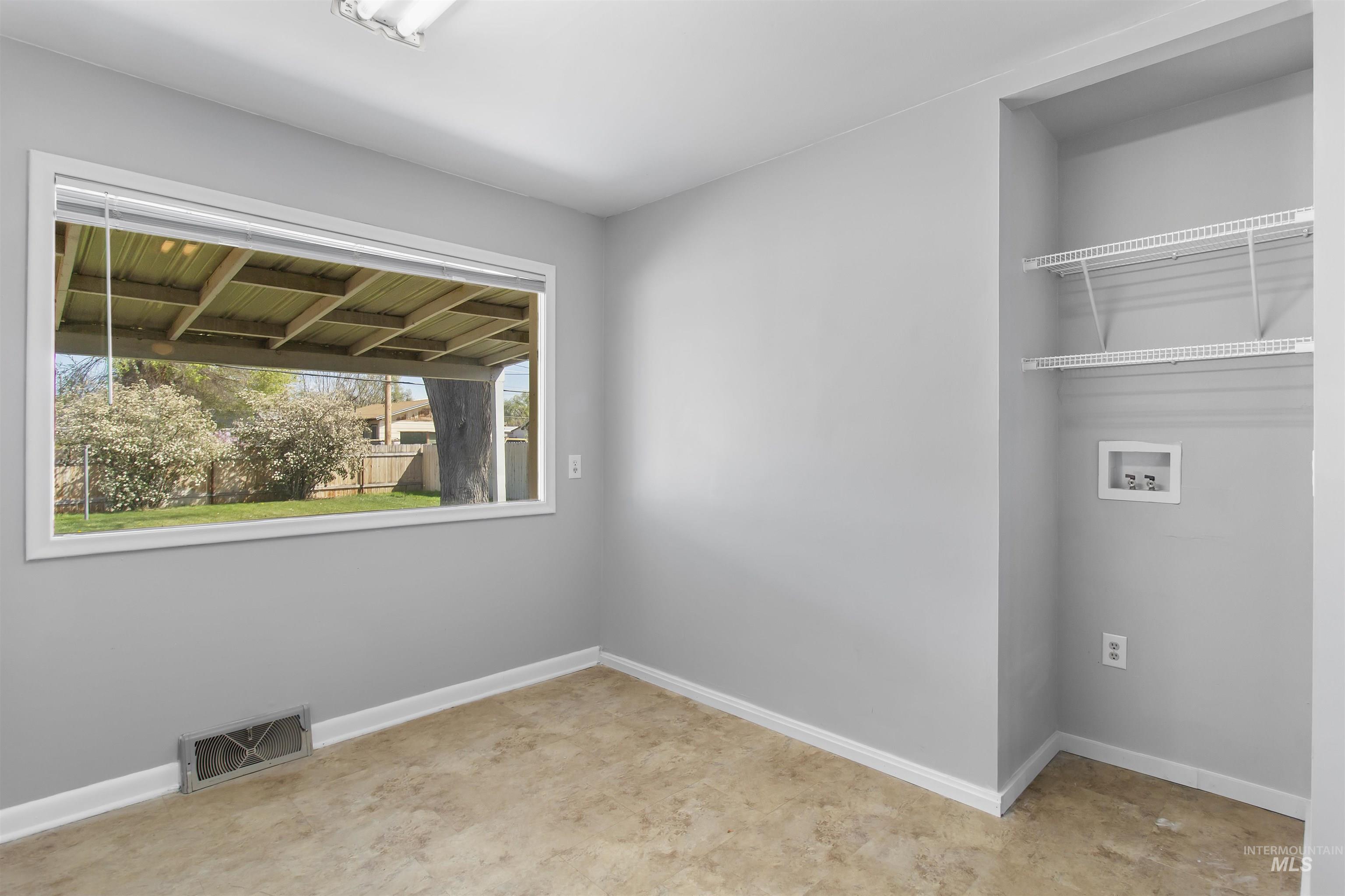 412 Madison Street Twin Falls, ID 83301 - Photo 13 of 42 Empty room featuring baseboards