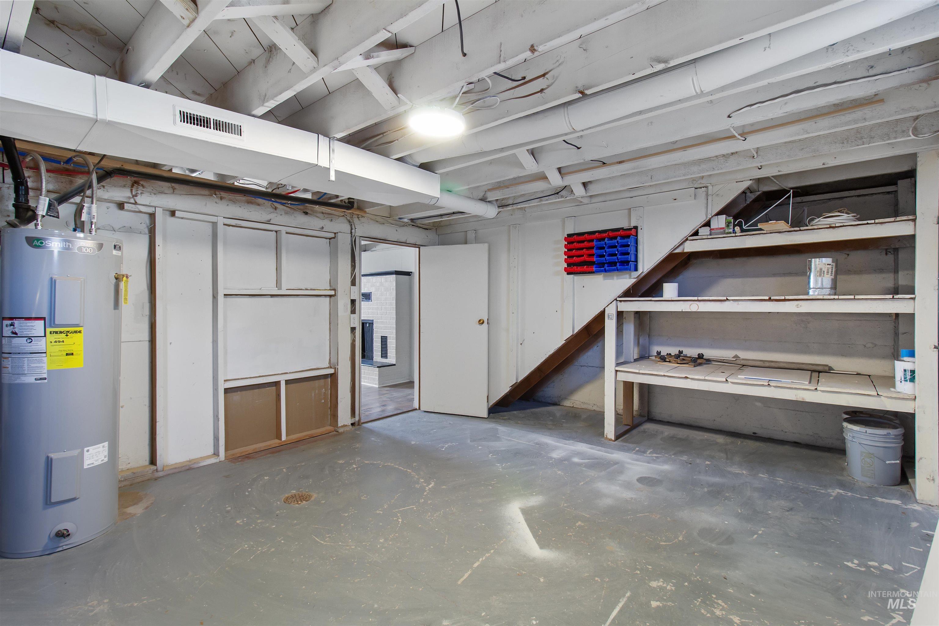 412 Madison Street Twin Falls, ID 83301 - Photo 23 of 42 Unfinished basement with water heater