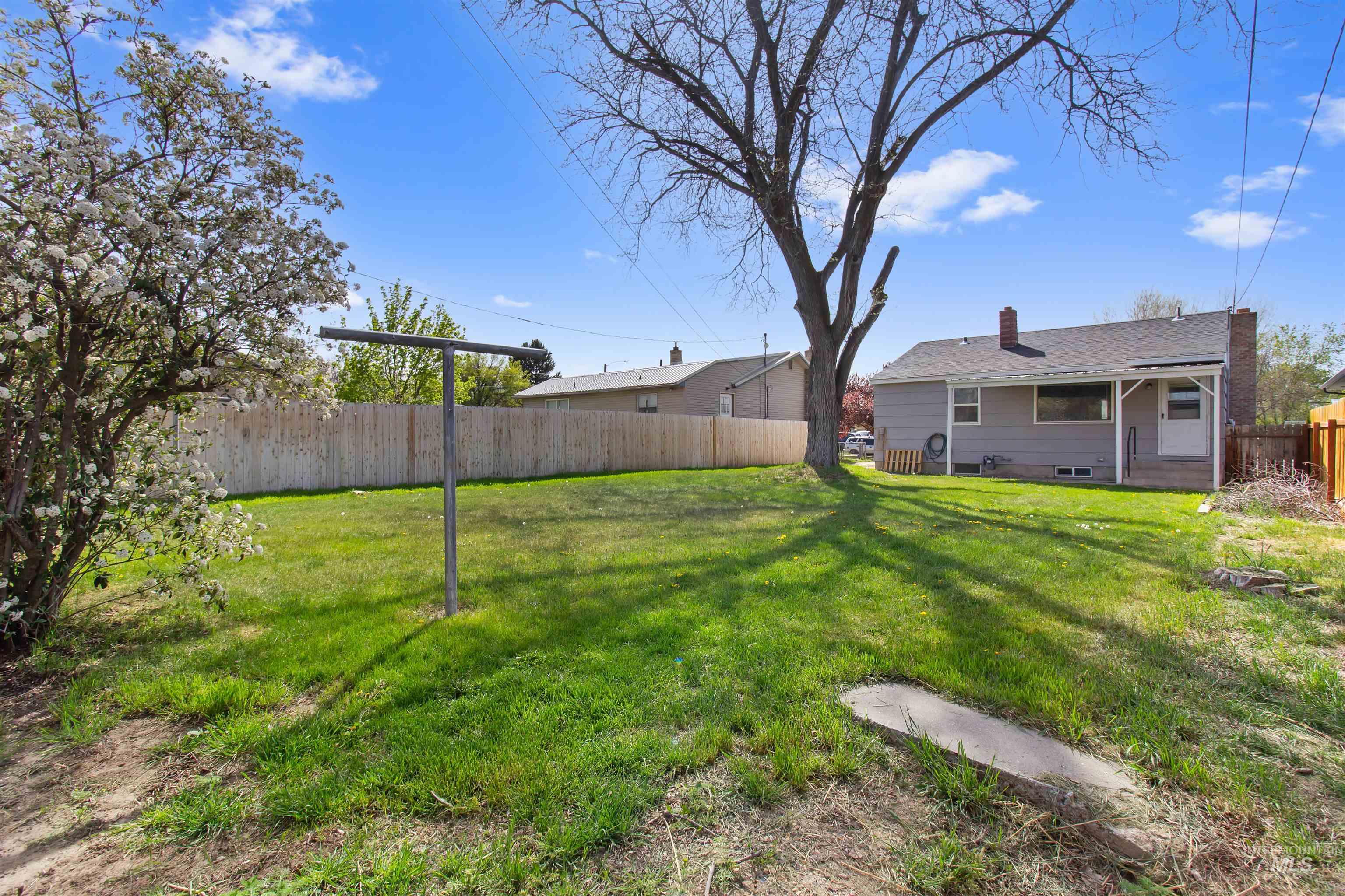 412 Madison Street Twin Falls, ID 83301 - Photo 28 of 42 Fenced backyard featuring a patio