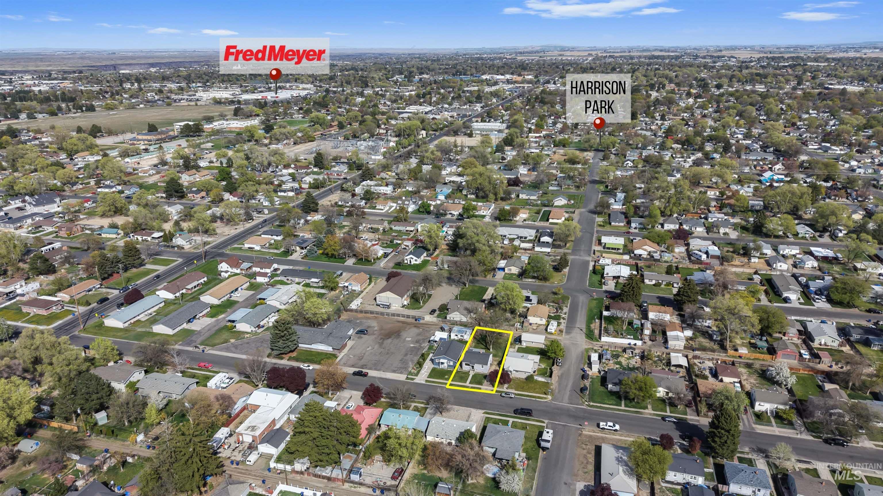 412 Madison Street Twin Falls, ID 83301 - Photo 36 of 42 Aerial perspective of suburban area featuring property parcel outlined
