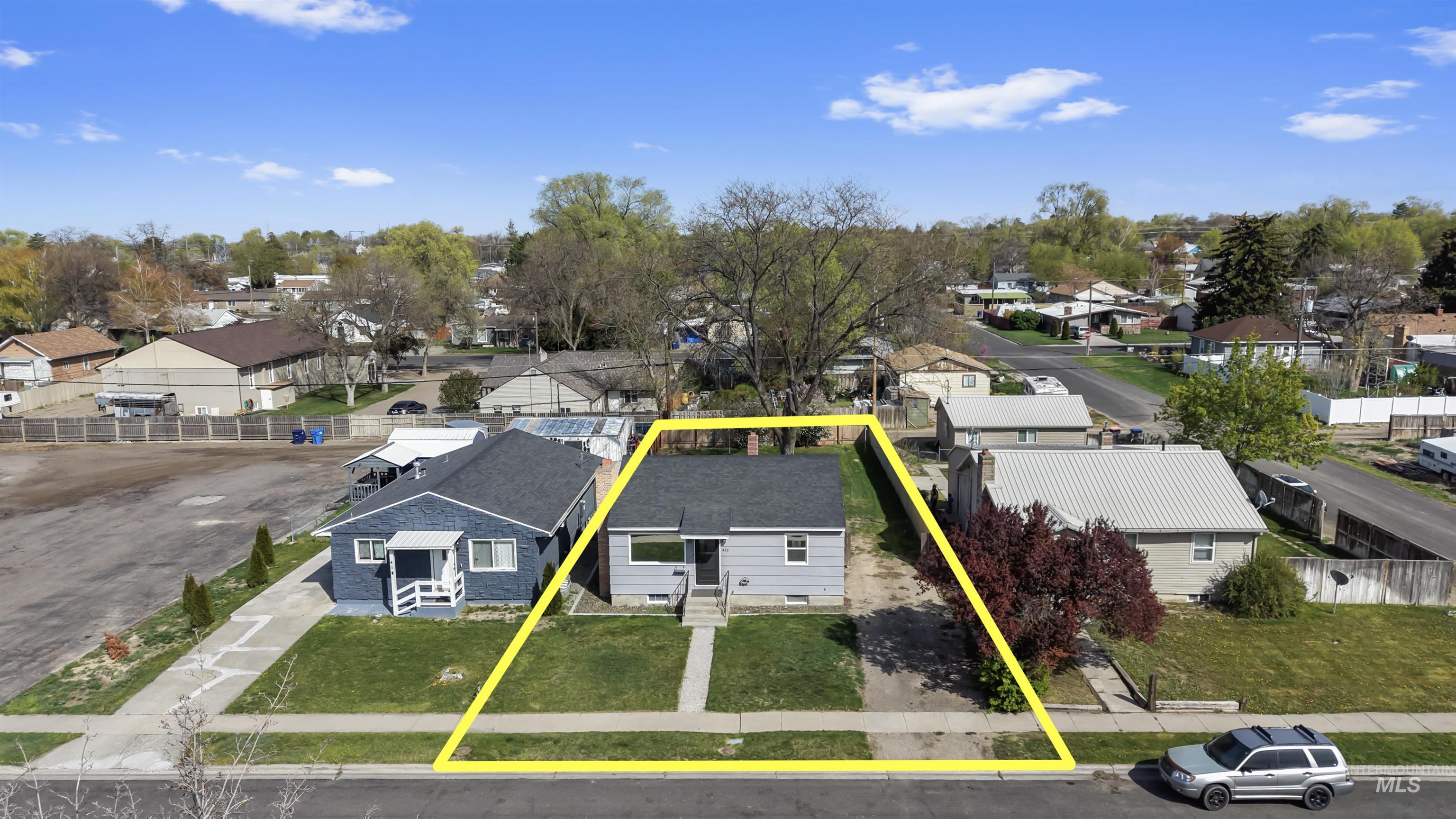 412 Madison Street Twin Falls, ID 83301 - Photo 41 of 42 Aerial perspective of suburban area with property boundaries highlighted