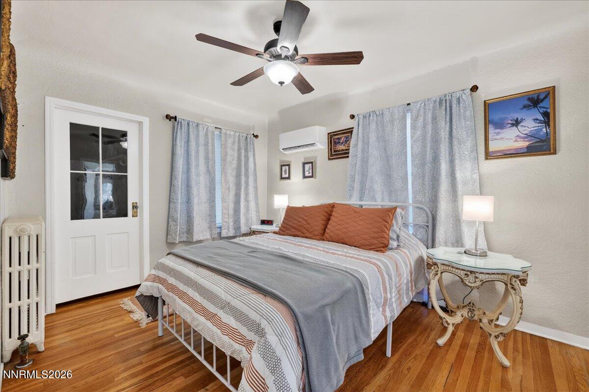 611 Nixon Avenue Reno, NV 89509 - Photo 11 of 43 a bedroom with a bed and a window