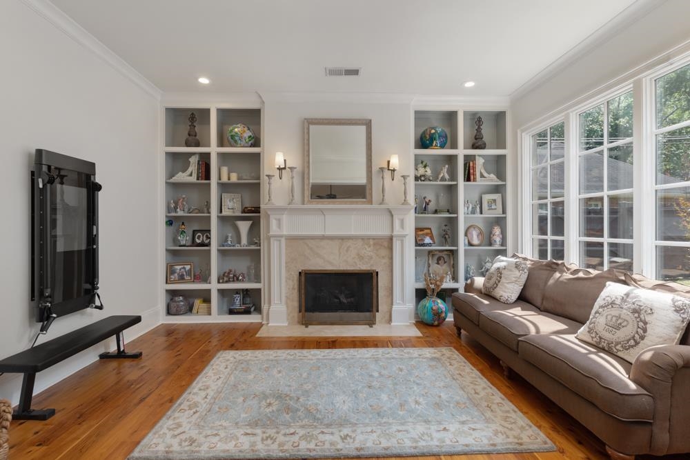 5097 Cole Road Memphis, TN 38117 - Photo 12 of 25 a living room with furniture and a fireplace