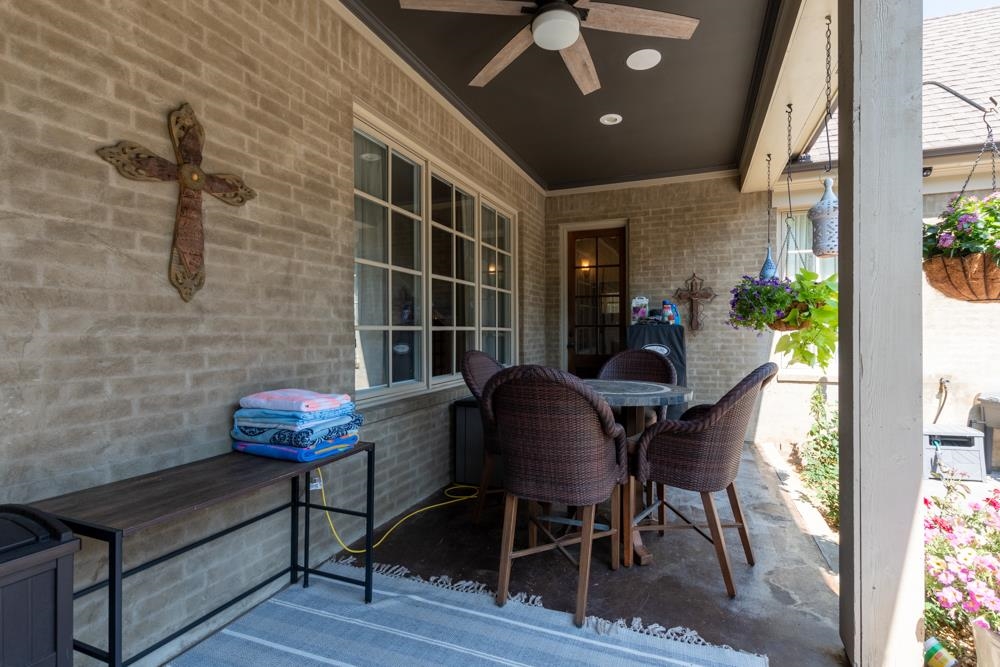 5097 Cole Road Memphis, TN 38117 - Photo 21 of 25 a dining room with furniture and wooden floor