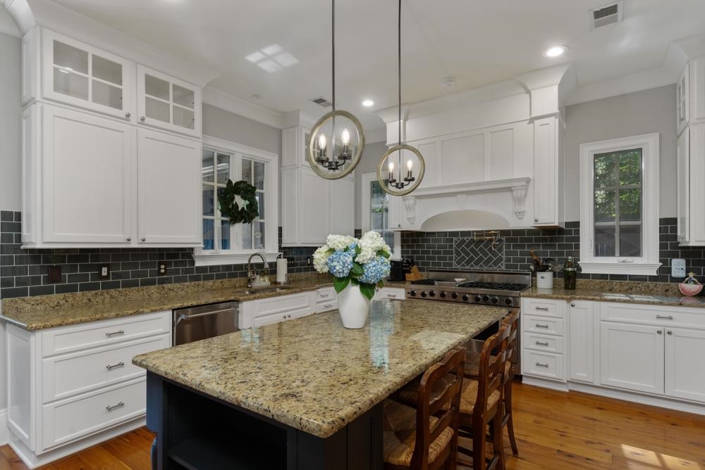 5097 Cole Road Memphis, TN 38117 - Photo 8 of 25 a kitchen with a counter space cabinets and stainless steel appliances