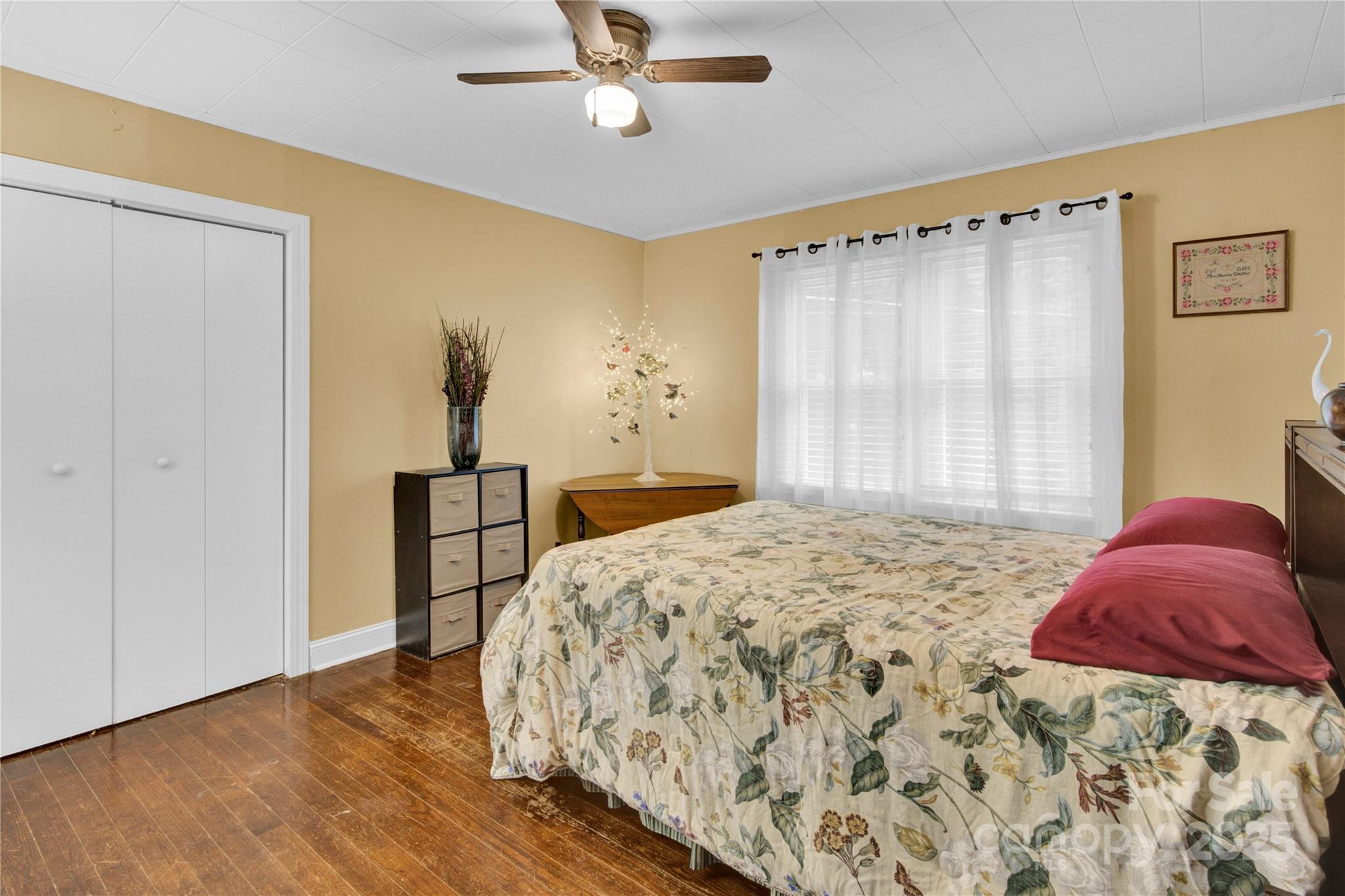 4959 King Wilkinson Road Denver, NC 28037 - Photo 16 of 41 a bedroom with a bed and a window