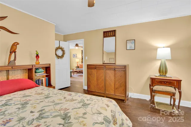a bedroom with a bed and cabinets