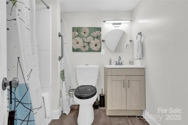 a bathroom with a toilet and a sink