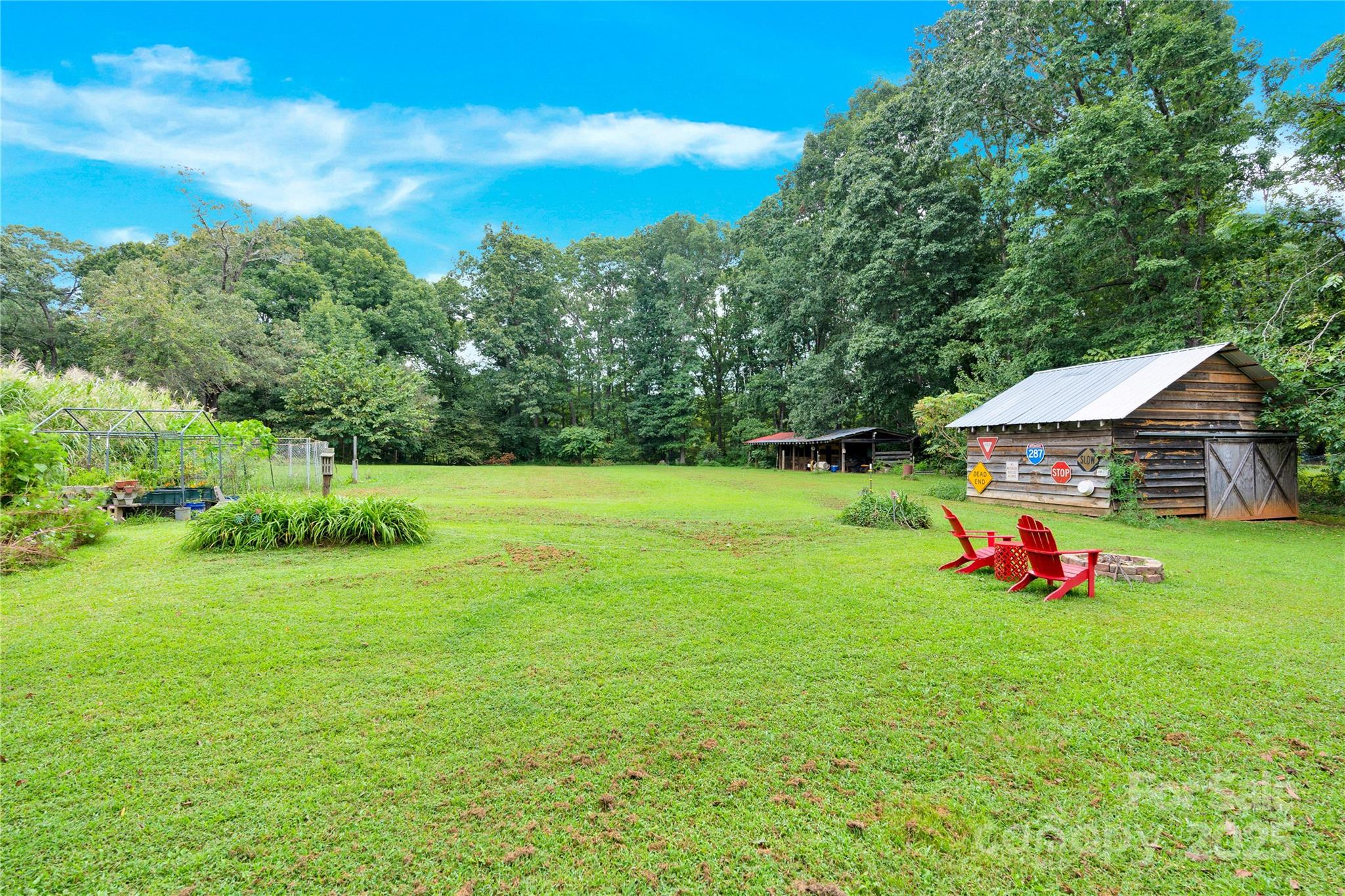 4959 King Wilkinson Road Denver, NC 28037 - Photo 26 of 41 a view of an house with a yard