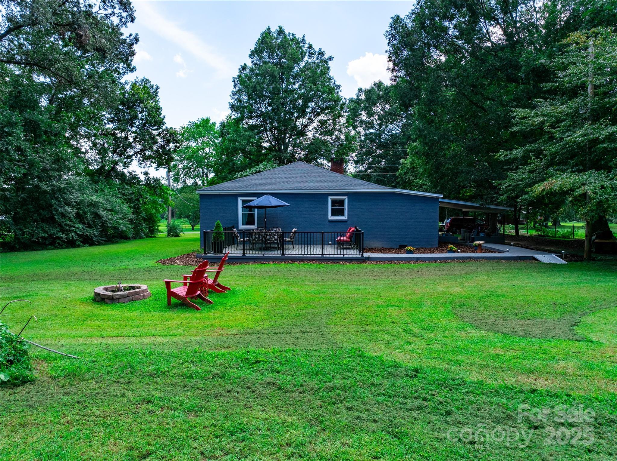 4959 King Wilkinson Road Denver, NC 28037 - Photo 35 of 41 a front view of a house with garden