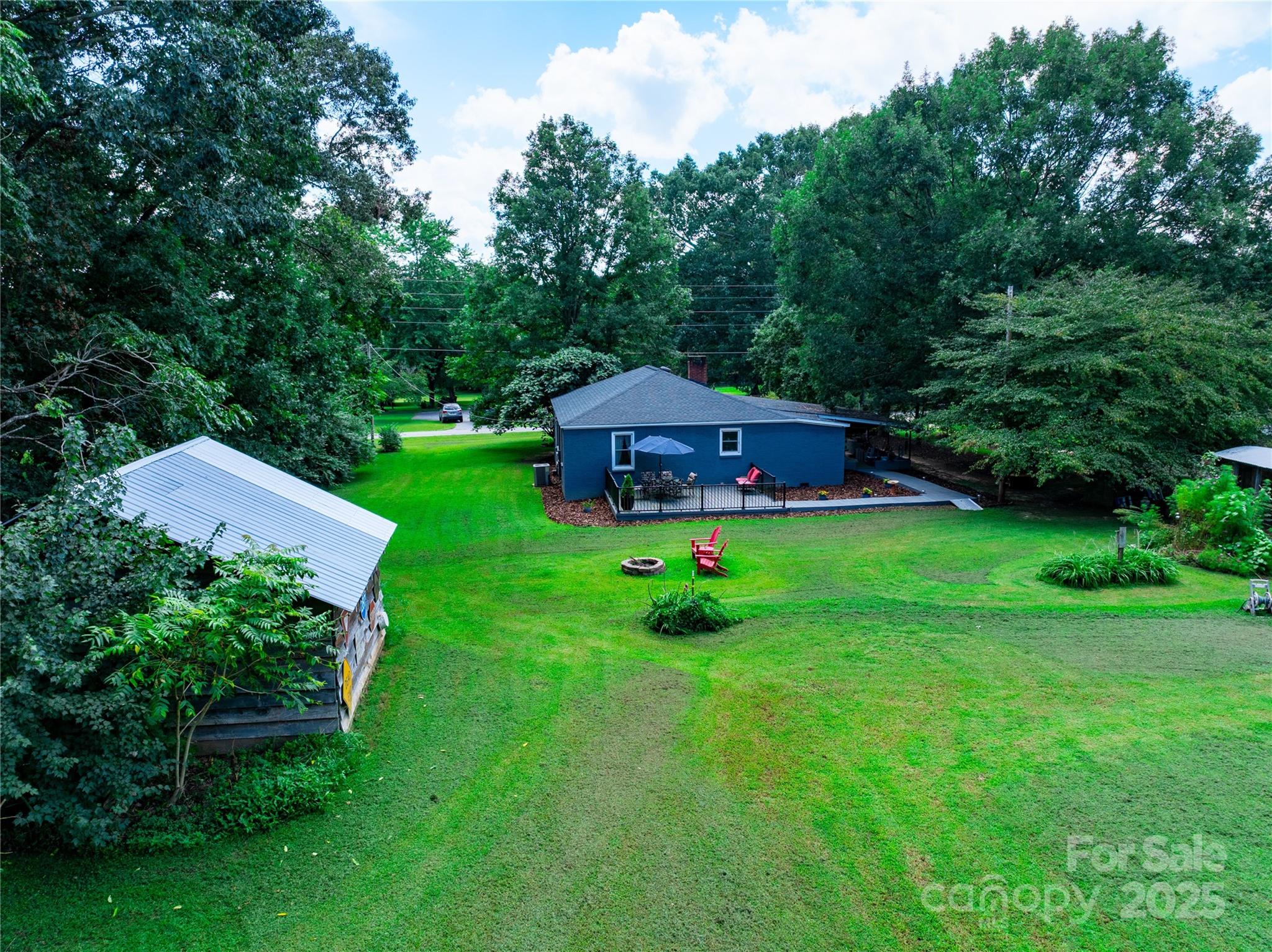 4959 King Wilkinson Road Denver, NC 28037 - Photo 39 of 41 a view of a house with a yard