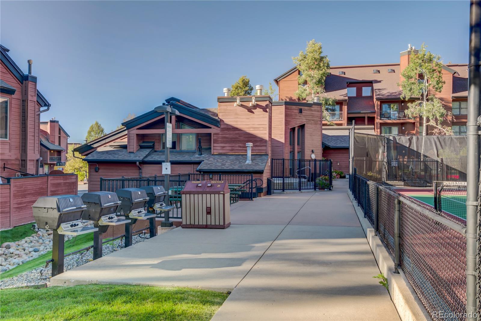 2015 Walton Creek Road, Unit 114 Steamboat Springs, CO 80487 - Photo 23 of 29 a view of a house with a park