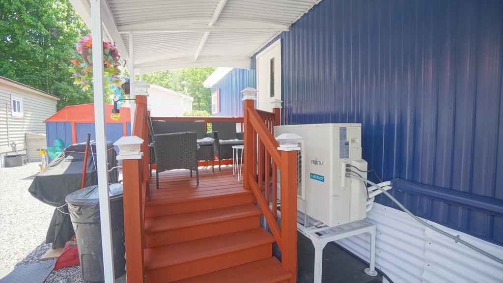 93 Grochmal Avenue, Unit 126 Springfield, MA 01151 - Photo 7 of 35 a view of outdoor space with seating area