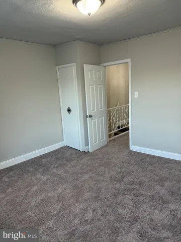 an empty room with an entryway