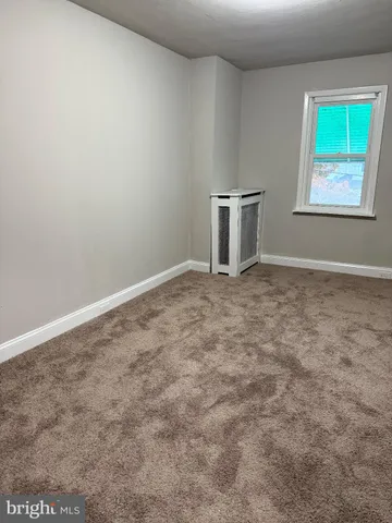 an empty room with a workbench