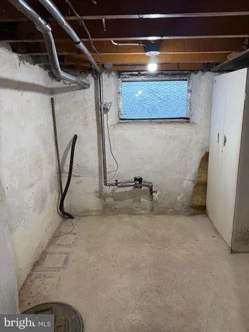 a view of a room with wooden walls