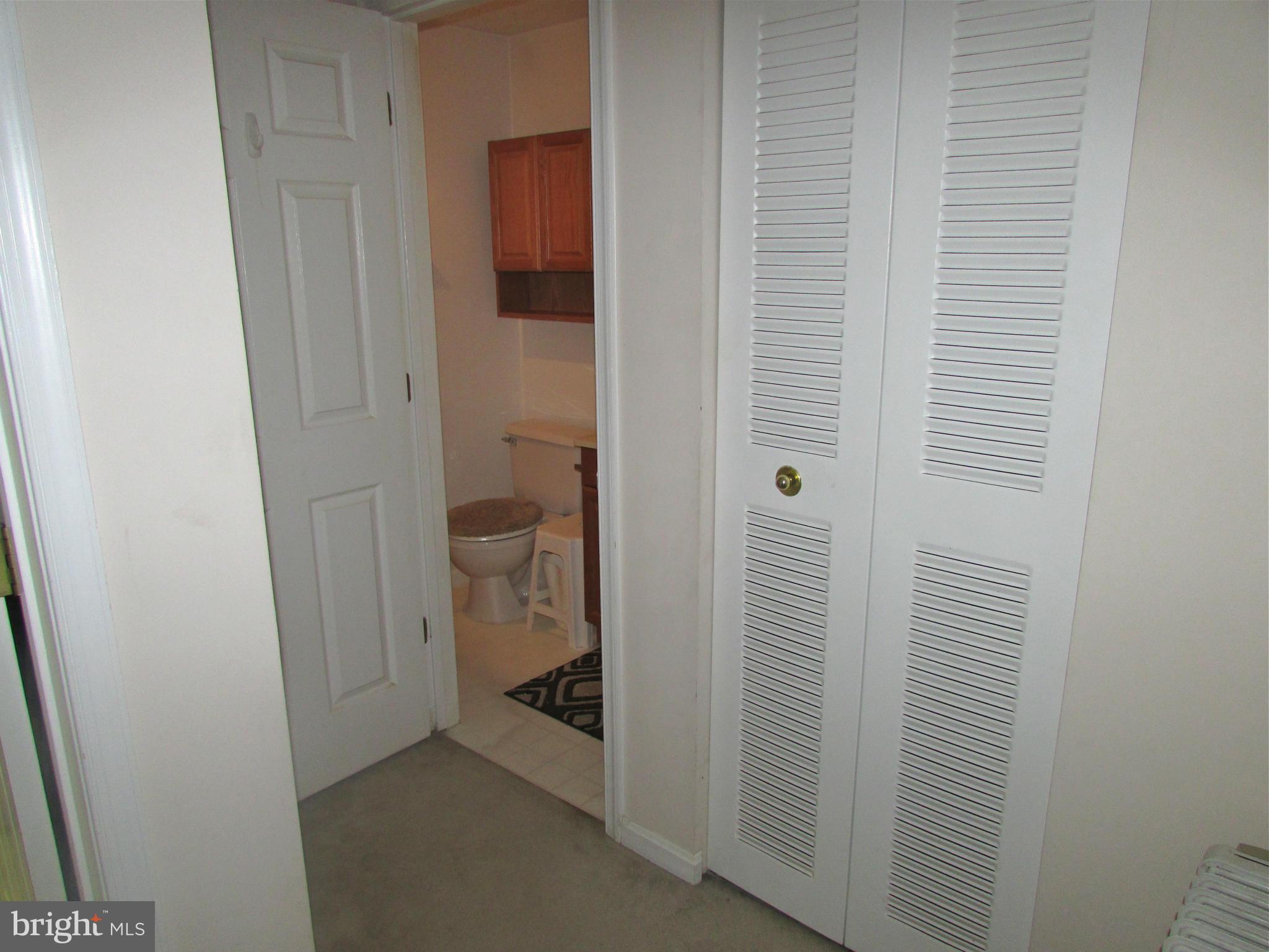 6808 Compton Valley Place Centreville, VA 20121 - Photo 14 of 16 a bathroom with a sink and toilet