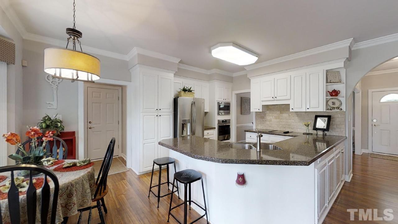 4012 Stone Summit Lane Raleigh, NC 27603 - Photo 8 of 20 Open Kitchen w/Breakfast Nook