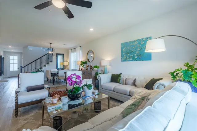 a kitchen with stainless steel appliances granite countertop a sink a stove and a microwave