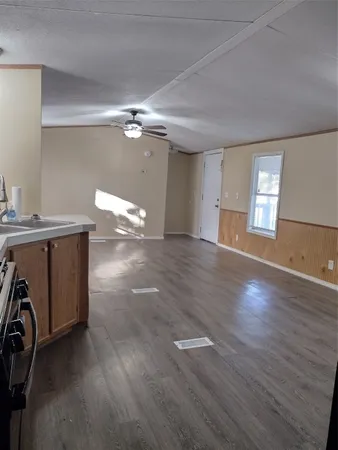 a view of a livingroom with a window