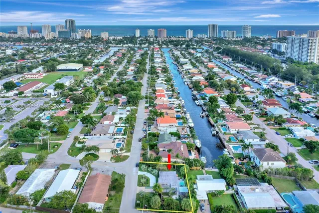 a house view with a garden space