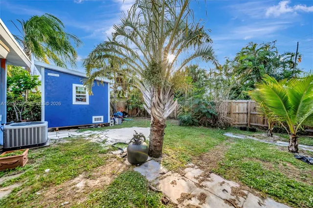 a view of a backyard of a house