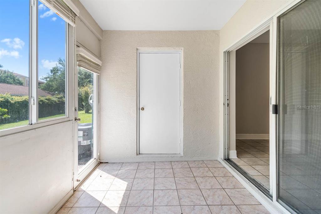 273 Countryside Key Boulevard Oldsmar, FL 34677 - Photo 24 of 32 a view of an entryway with a glass door