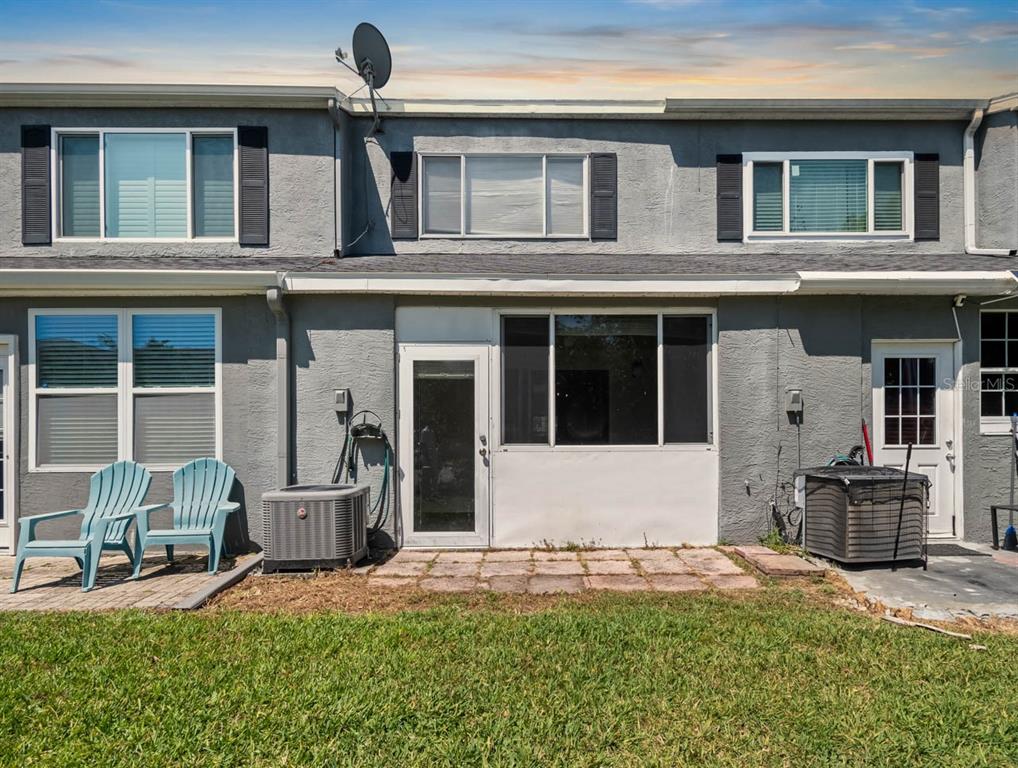 273 Countryside Key Boulevard Oldsmar, FL 34677 - Photo 27 of 32 a front view of a house with patio