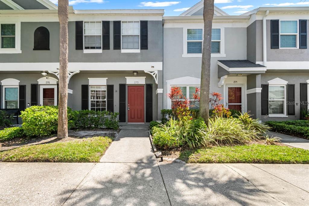 273 Countryside Key Boulevard Oldsmar, FL 34677 - Photo 29 of 32 a front view of multiple houses