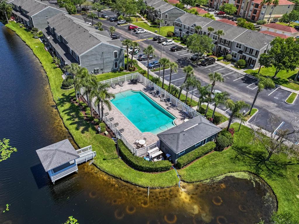 273 Countryside Key Boulevard Oldsmar, FL 34677 - Photo 3 of 32 an aerial view of a house with a garden