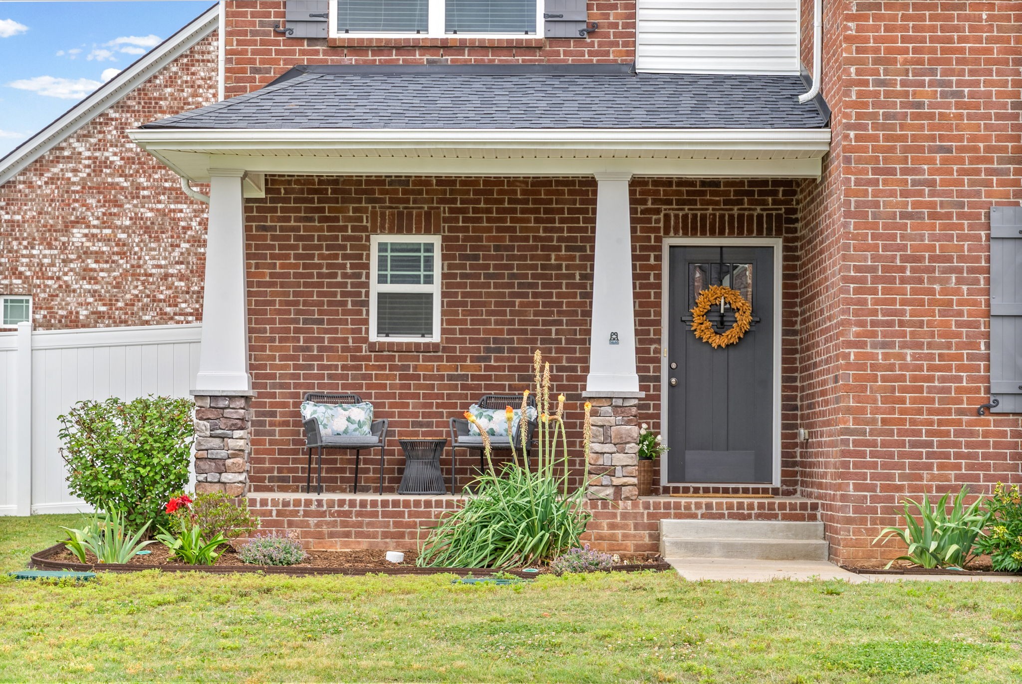 719 Reflections Lane Pleasant View, TN 37146 - Photo 2 of 46 a front view of a house with a yard