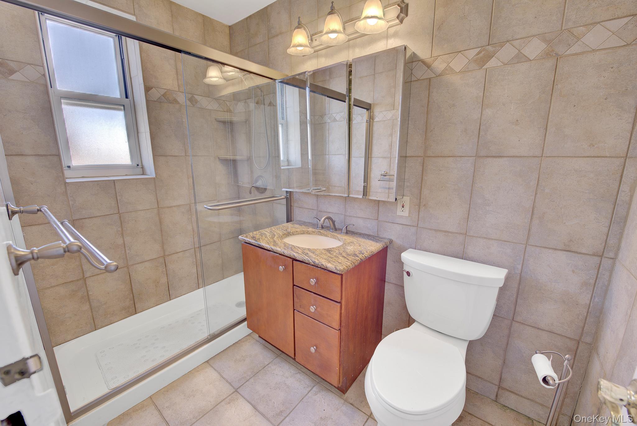 700 Shore Road, Unit 5M Long Beach, NY 11561 - Photo 12 of 34 Bathroom In Primary Bedroom..