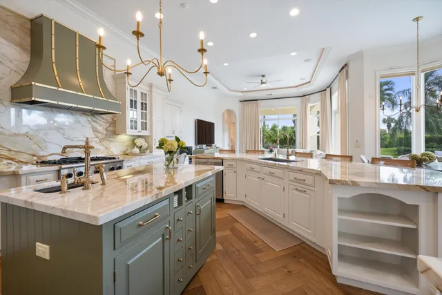 a kitchen with counter top space appliances and a sink