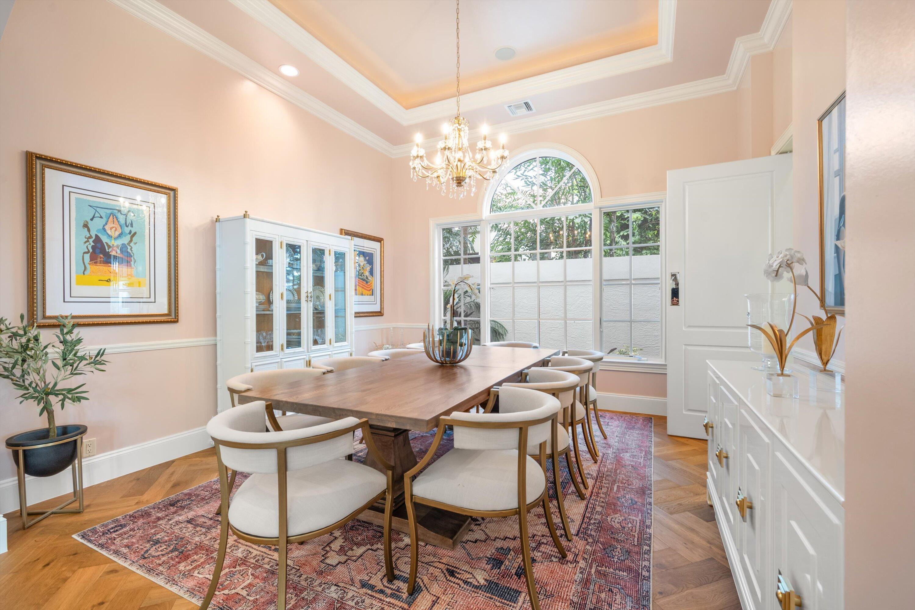 115 Echo Lane Jupiter, FL 33458 - Photo 14 of 35 a view of a dining room with furniture window and wooden floor