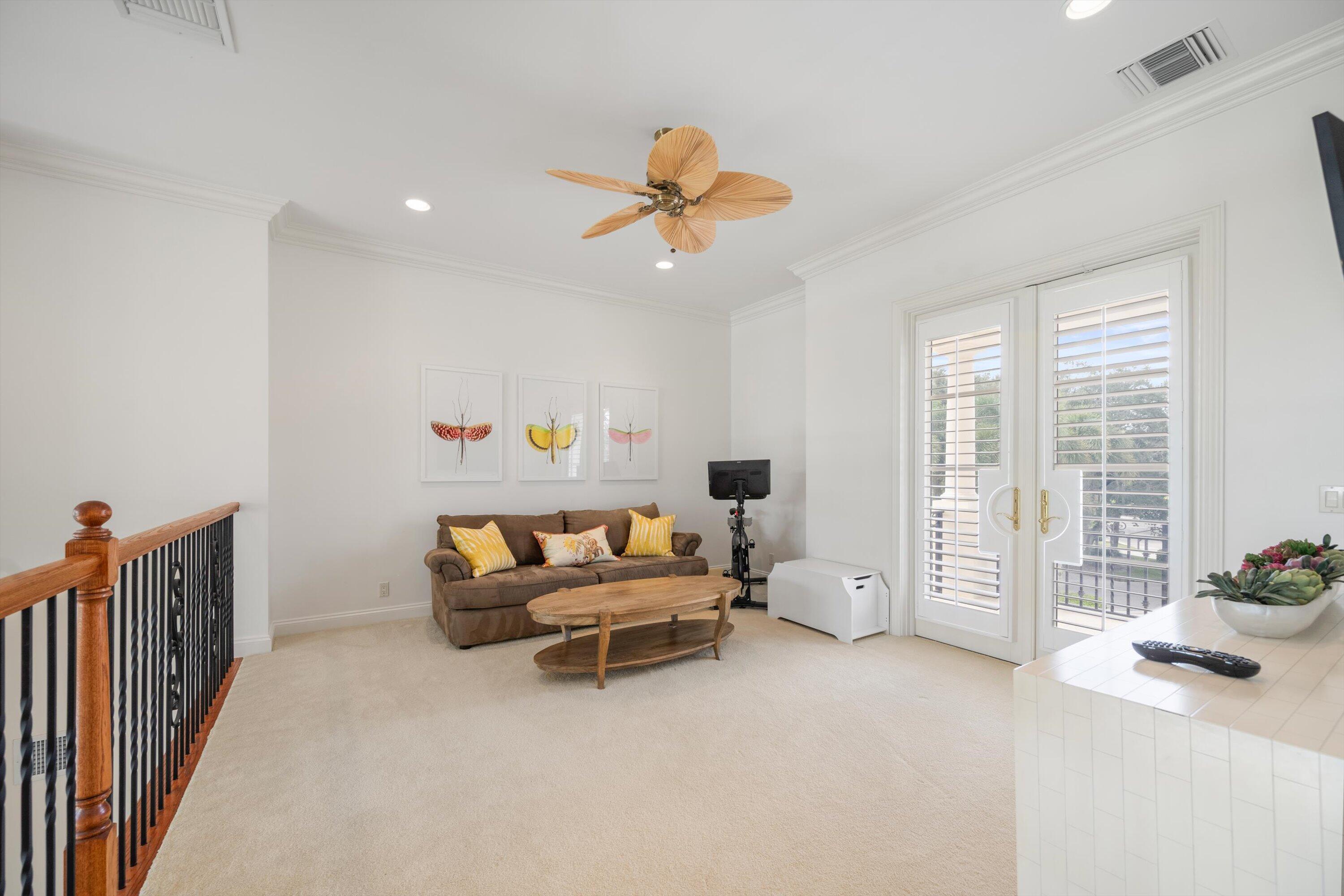 115 Echo Lane Jupiter, FL 33458 - Photo 16 of 35 a bedroom with furniture and a window