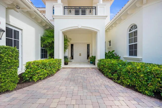 a view of entrance of house with stairs