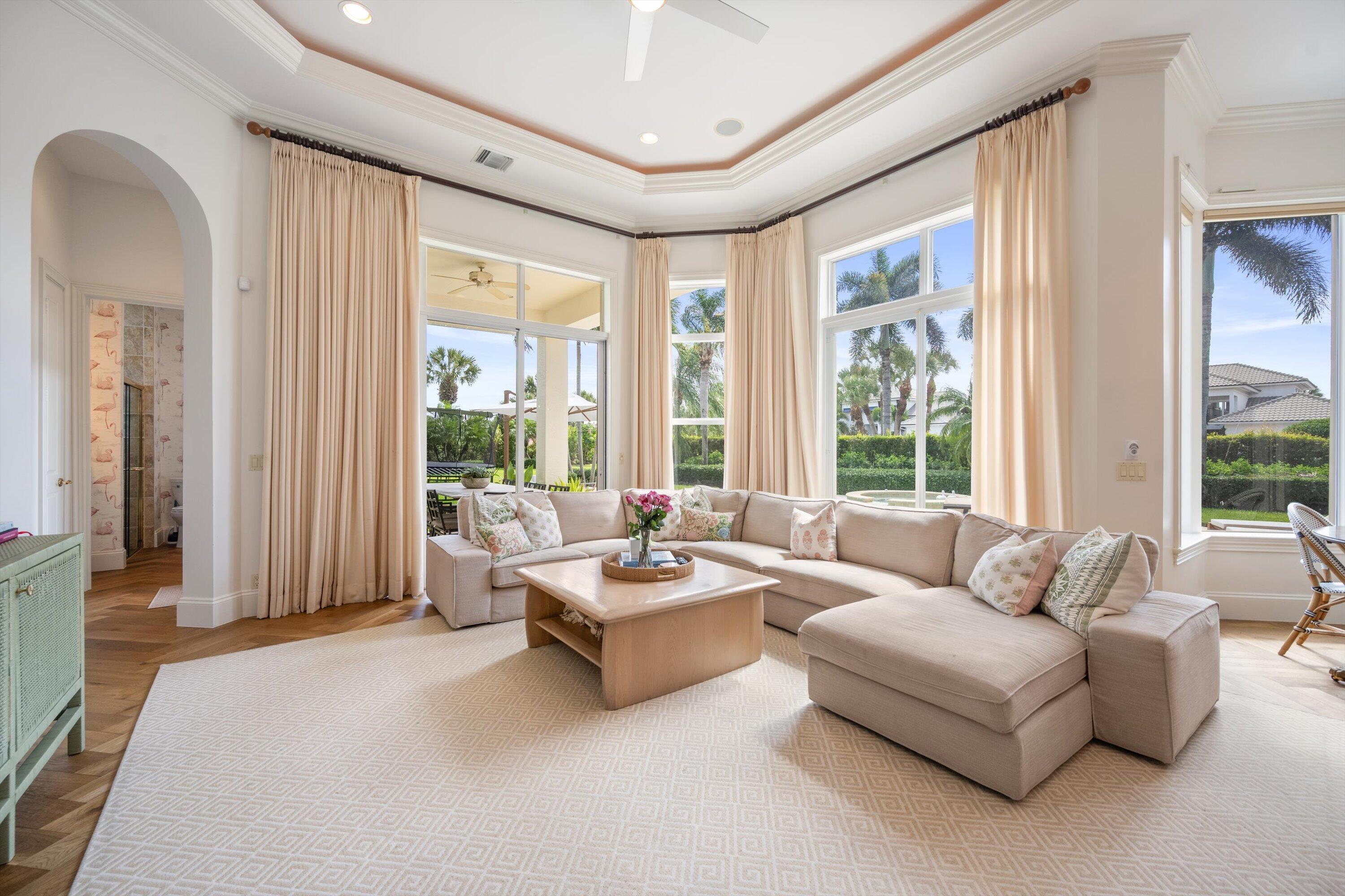 115 Echo Lane Jupiter, FL 33458 - Photo 8 of 35 a living room with furniture and a large window