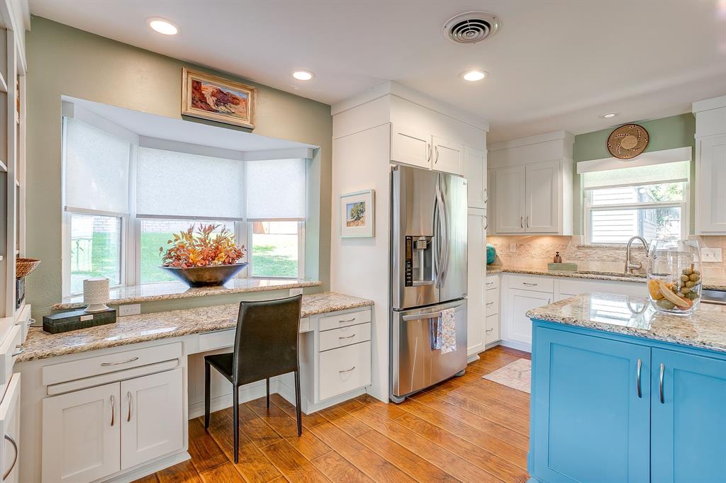 1816 Granada Road Fort Worth, TX 76116 - Photo 11 of 40 a kitchen with stainless steel appliances granite countertop a refrigerator and a stove top oven