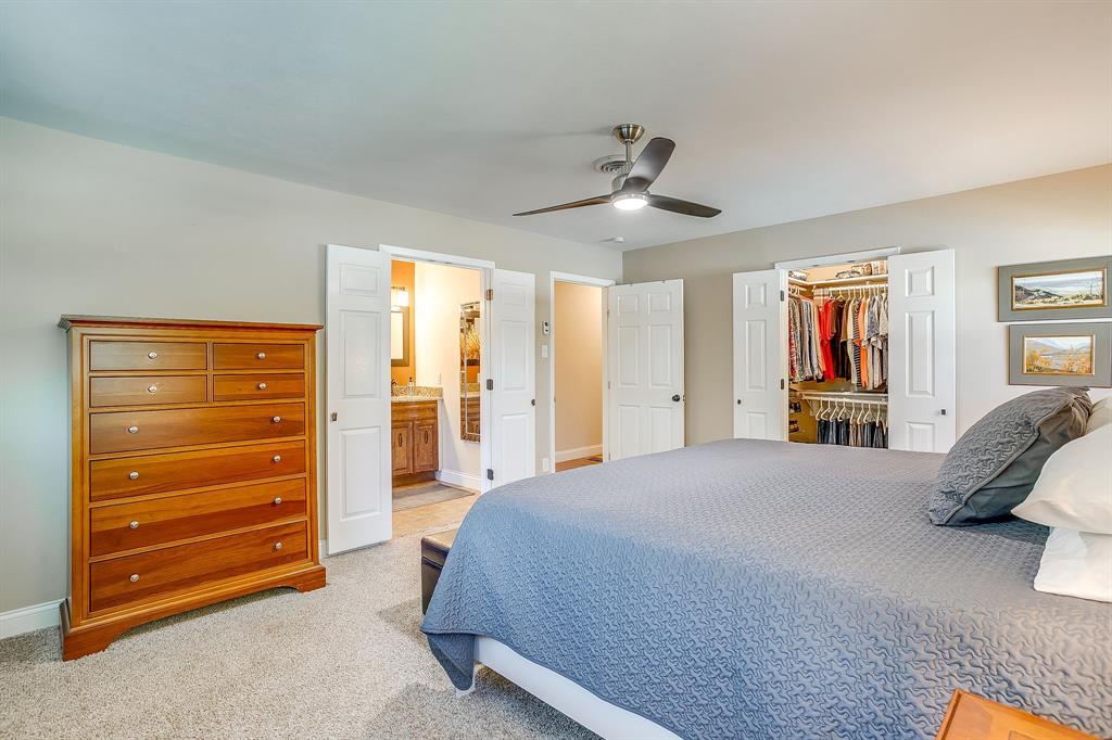 1816 Granada Road Fort Worth, TX 76116 - Photo 20 of 40 a bedroom with a bed and a dresser