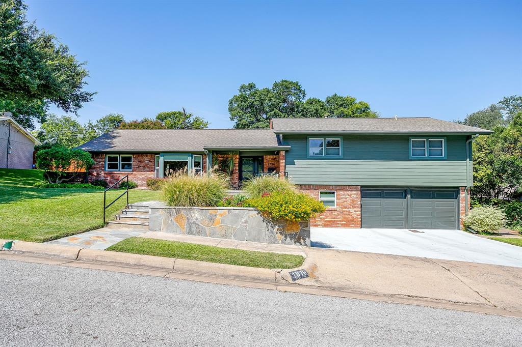 1816 Granada Road Fort Worth, TX 76116 - Photo 3 of 40 front view of a house with a yard