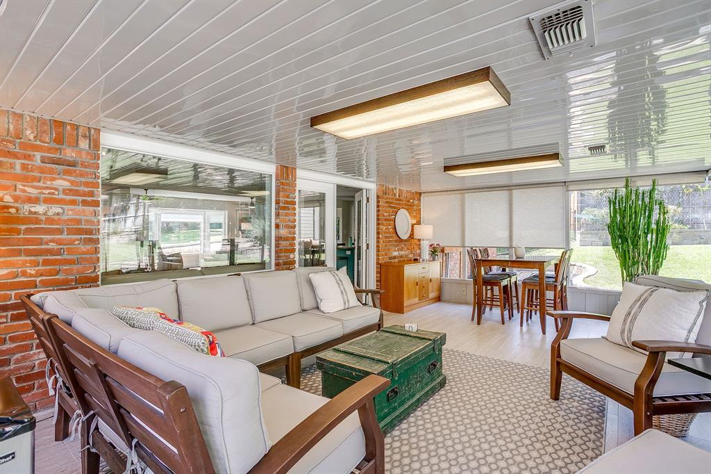 1816 Granada Road Fort Worth, TX 76116 - Photo 33 of 40 a living room with furniture and a large window