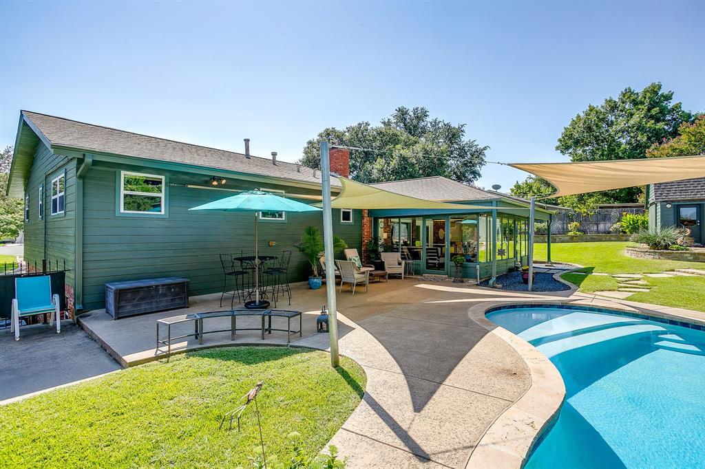 1816 Granada Road Fort Worth, TX 76116 - Photo 37 of 40 a view of a house with swimming pool and sitting area
