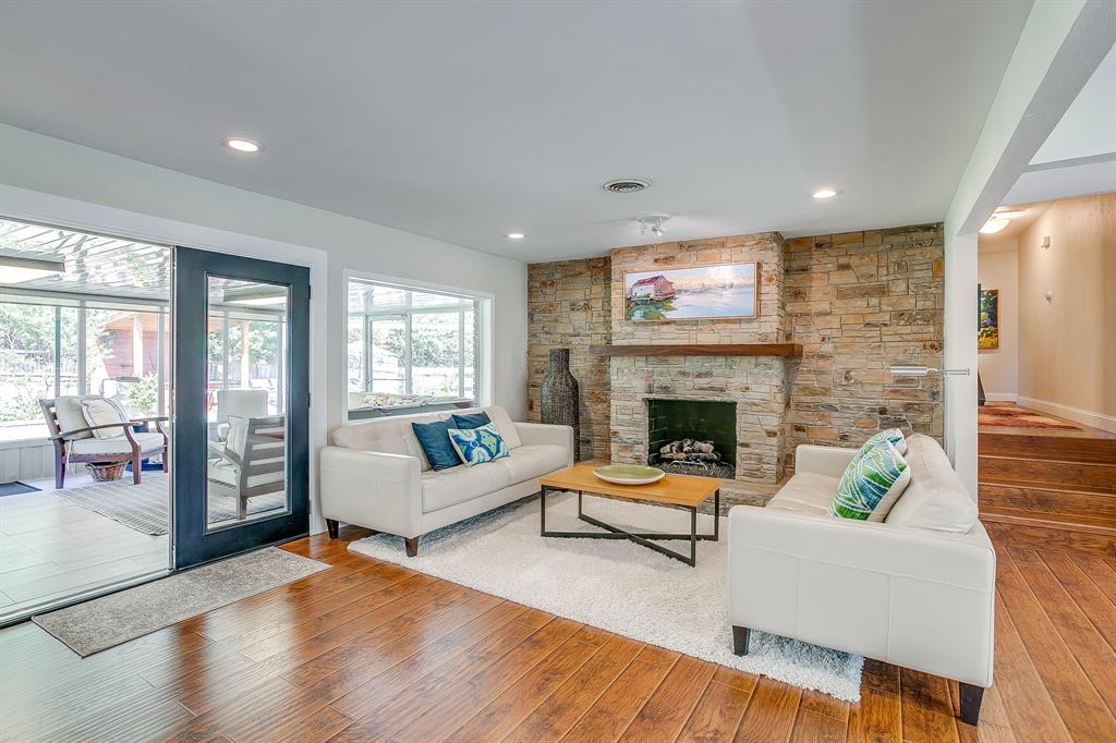 1816 Granada Road Fort Worth, TX 76116 - Photo 6 of 40 a living room with furniture and a fireplace